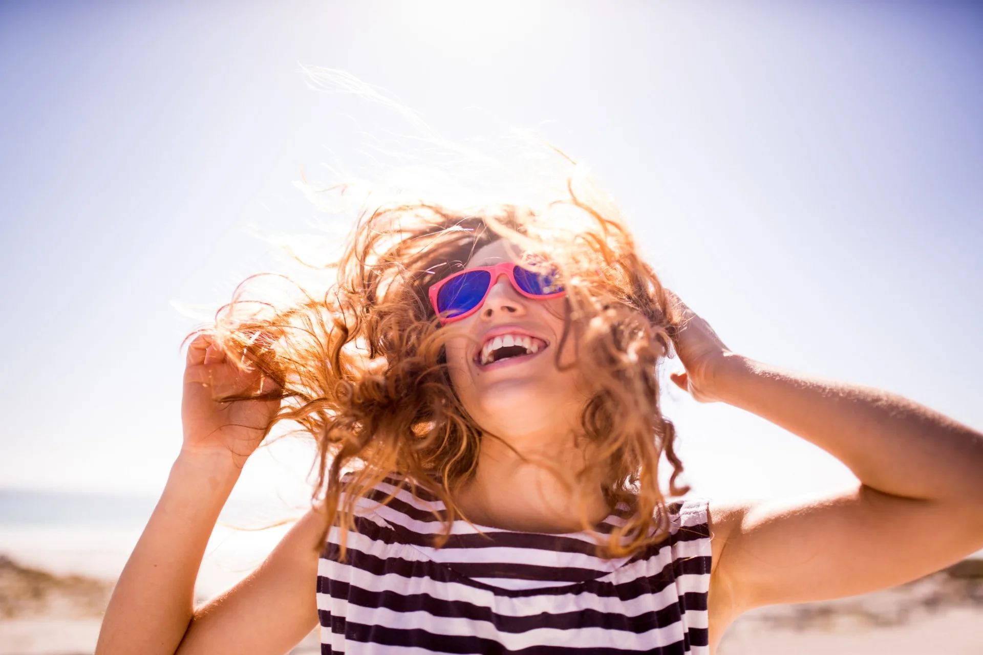 cheerful woman on beach